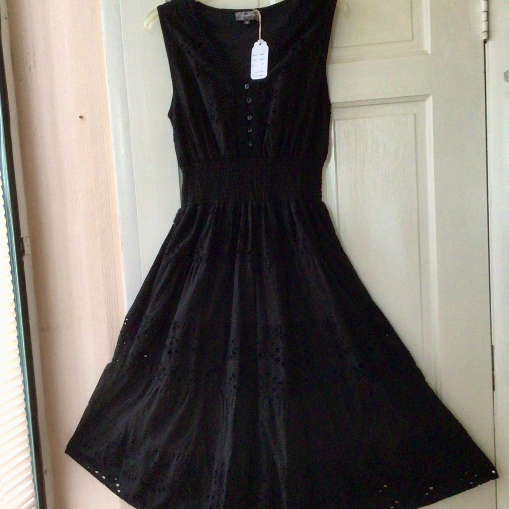 Black cotton sleeveless dress, eyelets